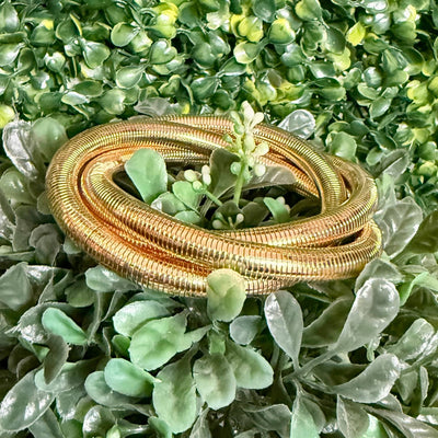 3 - Strand Slinky Style Goldtone Bracelet Shabby Chic Boutique and Tanning Salon