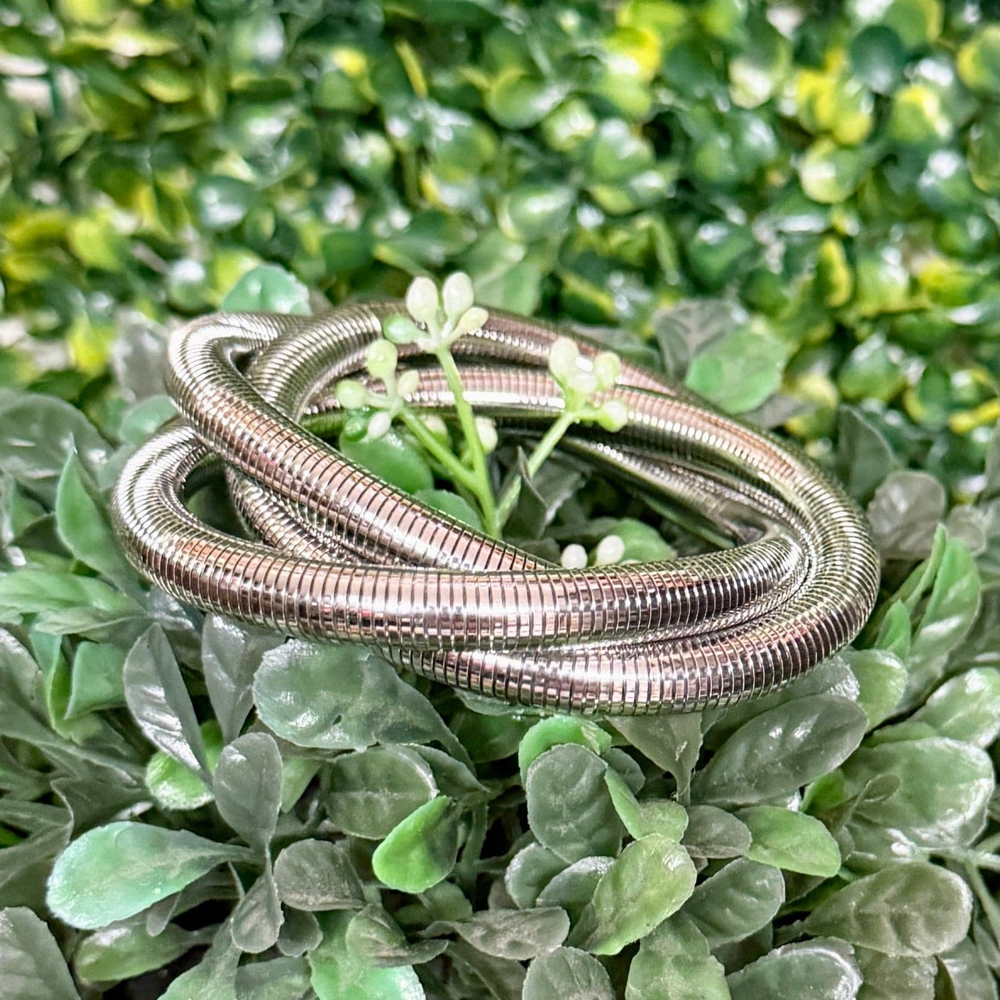 3 - Strand Slinky Style Silvertone Bracelet Shabby Chic Boutique and Tanning Salon