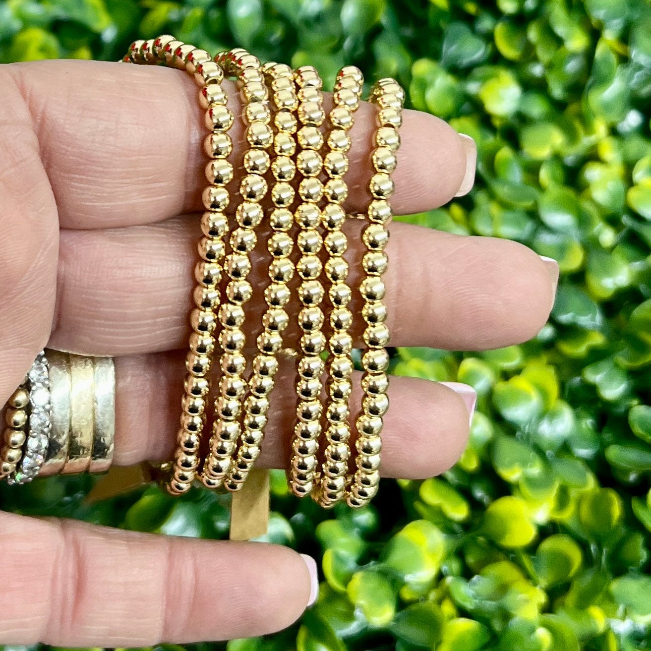 Goldtone 4mm Stretch Bracelet Shabby Chic Boutique and Tanning Salon