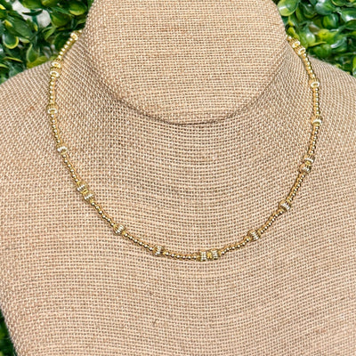 Goldtone Beaded Necklace with Fluted Beads Shabby Chic Boutique and Tanning Salon