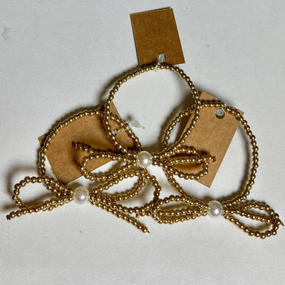 Goldtone Bow Bracelet Shabby Chic Boutique and Tanning Salon