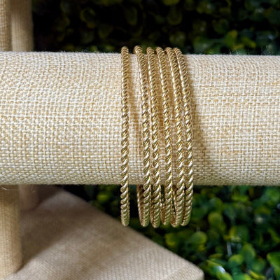 Goldtone Twist Bangles Shabby Chic Boutique and Tanning Salon