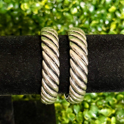 Silvertone Twist Stretch Bracelet Shabby Chic Boutique and Tanning Salon