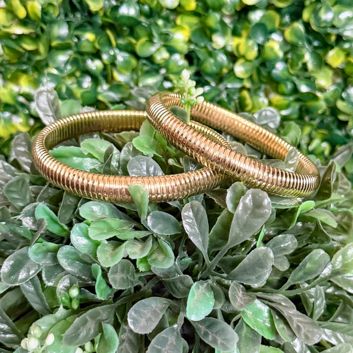 Stretchy Goldtone Tube Style Bracelet Shabby Chic Boutique and Tanning Salon